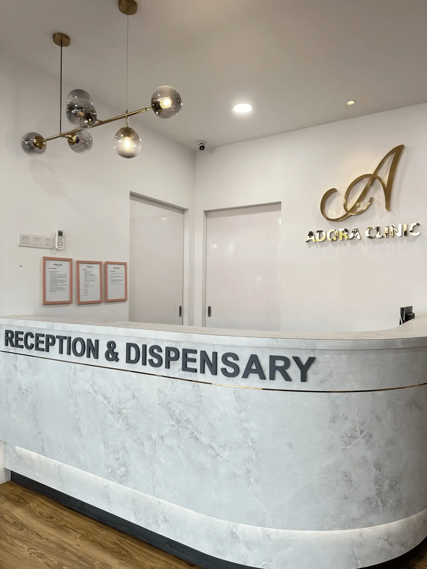 Adora Clinic's reception and dispensary in Sunway Velocity, Kuala Lumpur, Malaysia.